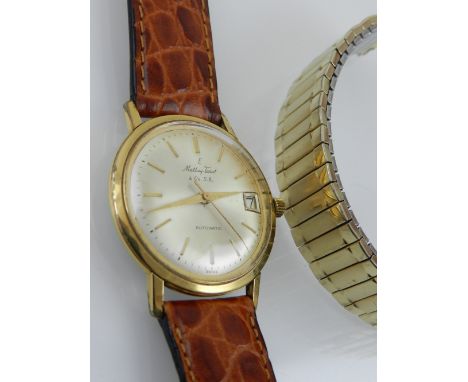 Mathey-Tissot & Co., SA. A mid 20th century gentleman's gold plated dress watch, the champagne dial marked baton numerals wit