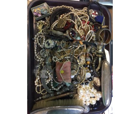 A large quantity of vintage costume jewellery.