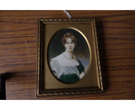 Oval portrait miniature young lady In green dress c1810 on ivory 8cms