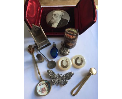 A miscellany to include silver throne, silver and enamel spoon, miniature scent bottles etc.