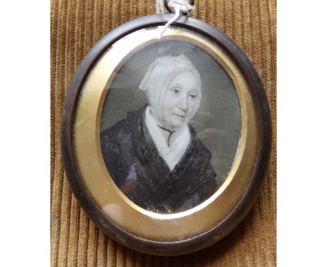 Oval portrait miniature on ivory old lady in a bonnet 5.5cms.