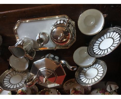 Bavarian tea service with white metal mounts.
