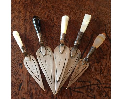 Five trowel bookmarks, various handles including mother of pearl, banded agate etc.