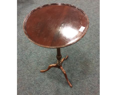 Mahogany tripod table.