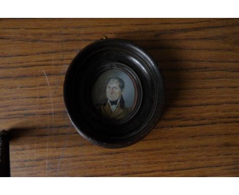 Oval portrait miniature, a gentleman on ivory, 4.5cms.