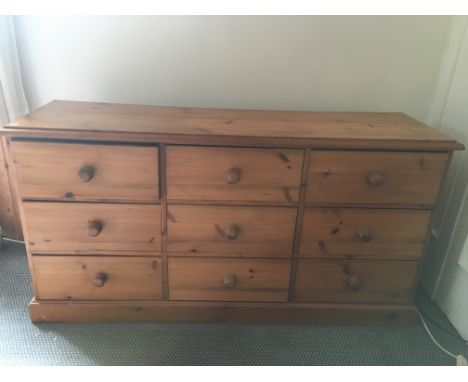 Bank of 9 drawers in vintage pine.155cms x46cms