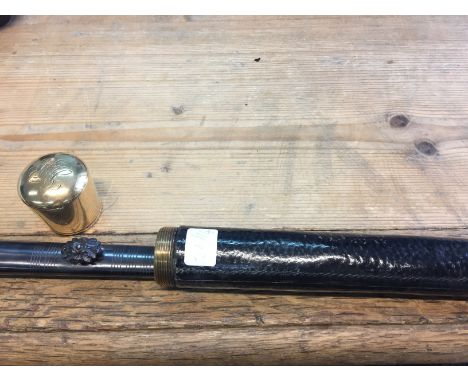 Masonic sword in leather bound walking stick carry case.