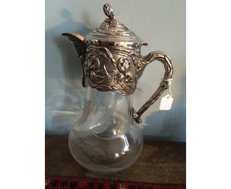 Art Nouveau claret jug with iris motif decoration.