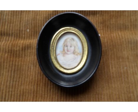 Oval portrait miniature of a young child on ivory HB 1916 4.5cms.