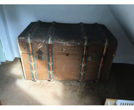 Wood bound canvas travelling trunk 97cms wide.