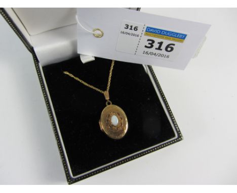 Early 20th century gold oval locket necklace set with an opal hallmarked 9ct