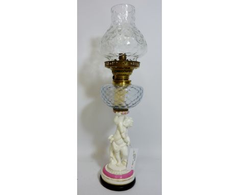 Early 20th century oil lamp, the base - possibly Worcester - modelled as a putto holding a cornucopia H53cm 