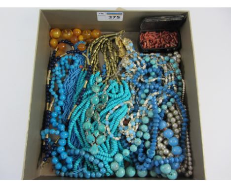Victorian papier mache snuff box containing coral branch beads, amber beads, vintage and later necklaces
