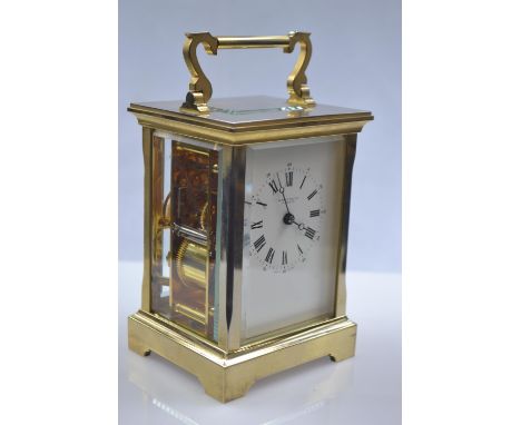Brass plated and glass 8 day striking carriage clock by W.Wray and Co. Plymouth, 11 jewels, W10 x D8.5 x H17cm, with keyPleas