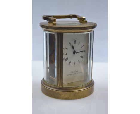 Brass and glass cylindrical carriage clock by the Chester Carriage Clock Company, dia. 9.5 x H15cm, with keySome tarnishing t