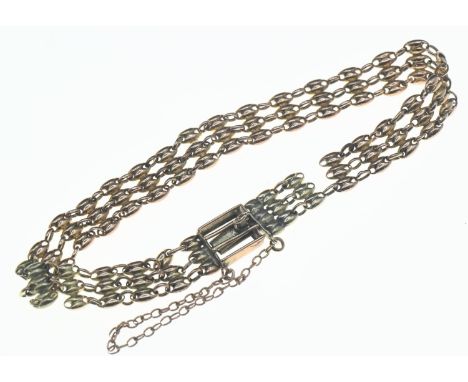 10ct gold gate link bracelet, circumference 16cm, 11.33 grams (scrap)links broken 