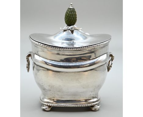 Silver tea caddy, Goldsmiths & Silversmiths Co Ltd, London 1916, of rounded rectangular-shape, the hinged cover with carved g