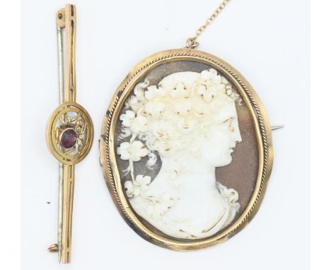 Cameo brooch with yellow metal surround, testing positive at 9ct. Gross weight 7.9g Together with a 9ct spider bar brooch, gr