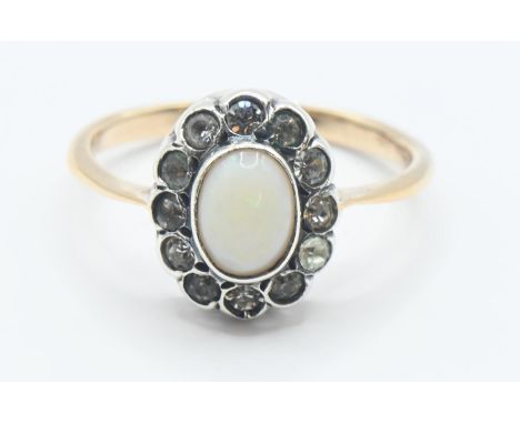 Opal & paste cluster ring with white metal mount on 9ct gold shank. Size M. Gross weight 2.2g 