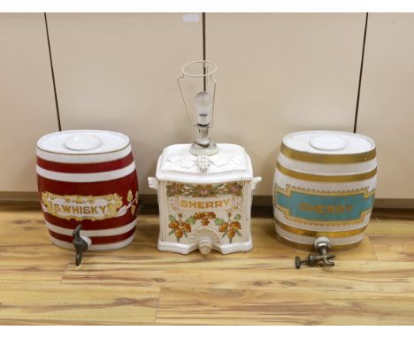 Two pottery sherry barrels (one mounted as a lamp) and flasks and a whisky barrel