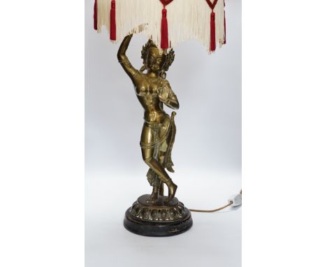A vintage Indian polished brass figure of a dancer on lotus base, now mounted as a lamp, 80cm including shade