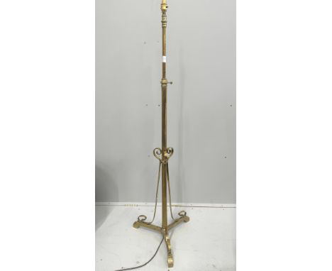 An Art Nouveau brass telescopic standard lamp, converted to electricity