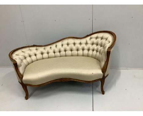 An early 20th century Louis XVI style beech button back show-wood couch, with carved and moulded frame, on cabriole legs, wid