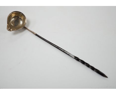 A George III silver toddy ladle with baleen handle and crested bowl, 34.5cm, unmarked