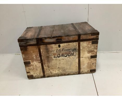A vintage iron bound pine trunk width 107cm, depth 62cm, height 68cm.