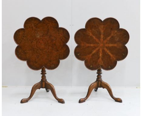 A pair of reproduction George III style mahogany and bird's eye maple tilt top tripod tea tables, width 68cm, height 69cm