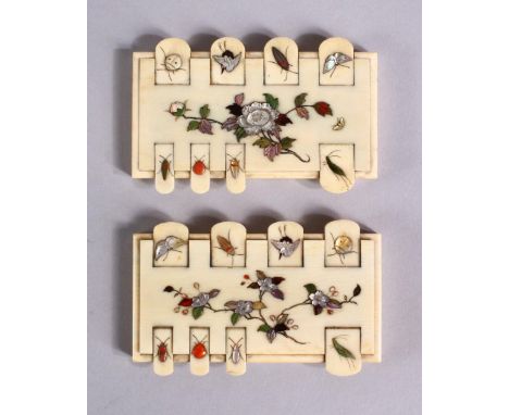 A PAIR OF JAPANESE MEIJI PERIOD SHIBAYAMA IVORY GAMES COUNTERS, each inlaid with semi precious stones / shells to depict nati