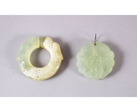 TWO CHINESE CARVED JADE BUTTERFLY &amp; DRAGON BI DISK PENDANTS, one pale almost translucent jade carved as butterfly 4.5cm, 