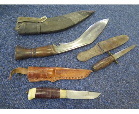 Knives as follows: 19th century (?) Kukri in scabbard, unmarked. Good condition. A Norwegian skinning/fishing knife in decora