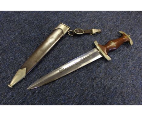 German SA Dagger with metal Scabbard and Hanger maker marked 'DRGM', blade maker marked 'ART-UND-HAUERFABRIK SOLINGER'. 