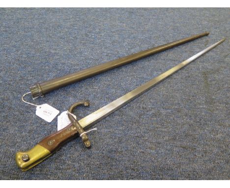 Bayonet: A good French Model 1874 Gras Epee Bayonet made at St. Etienne in February 1877. Matching numbers in its steel scabb