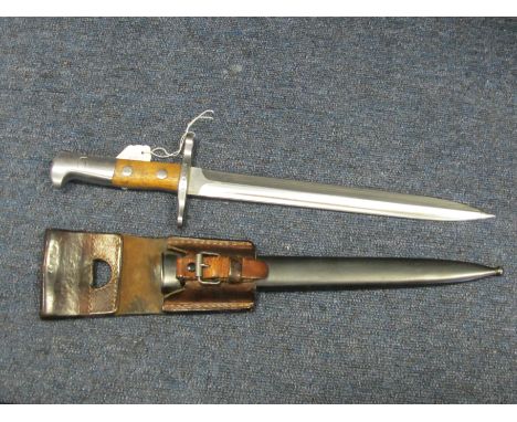 Bayonet: A fine Swiss Model 1918 bayonet in its blued steel scabbard with correct leather frog. Mint blade marked 'ELSENER SC