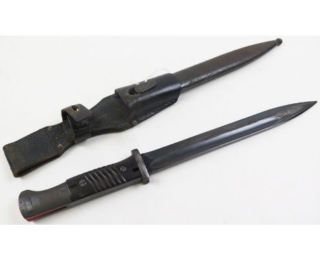 German K98 Bayonet with metal scabbard and leather frog, blade stamped 'S/155K' and '1131 C'. And frog stamped '0/0676 0039 4