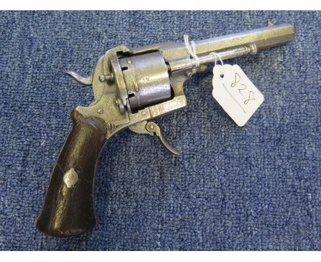 Belgian 9mm pinfire revolver. Barrel 4". Belgian proofs. Barrel marked 'Canon Acevisse'. Folding trigger. Side mounted ejecto