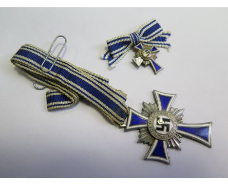 German WW2 Mothers Cross in silver with matching miniature  