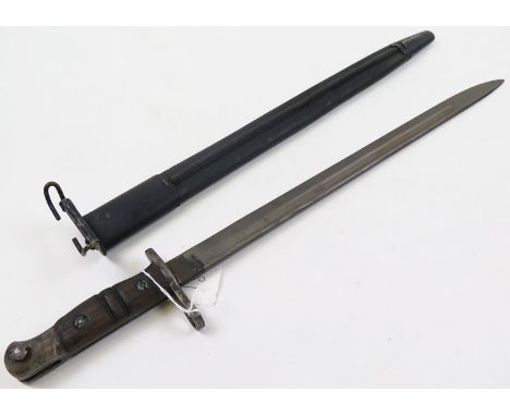 Bayonet - A pattern 1913 bayonet by Remington dated 4.16 in its steel mounted leather scabbard with US Belt Clip (Blade tip b