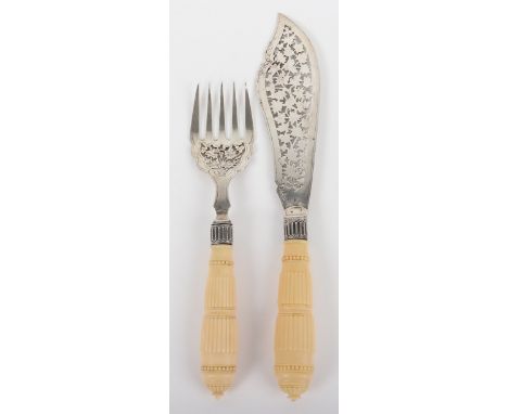 ^A pair of silver and ivory handle fish servers, Hilliard &amp; Thomason, Birmingham 1893, knife 30cm fork 24cm, total 284g