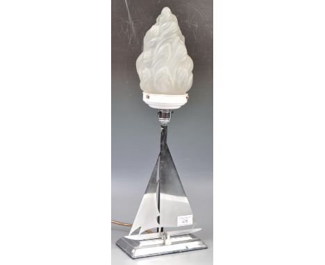 A superb 20th Century Art Deco vintage chrome&nbsp;desk table lamp light in the form of a yacht boat ship. The lamp having a 