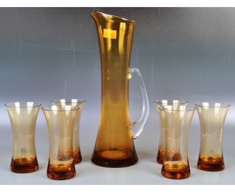 A 20th Century retro vintage studio art glass lemonade set in amber glass comprising of six beaker cups of tapering hourglass