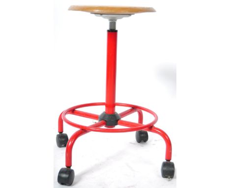 A 20th Century retro vintage industrial machinist factory work type stool&nbsp;having a bentwood moulded seat atop a metal st