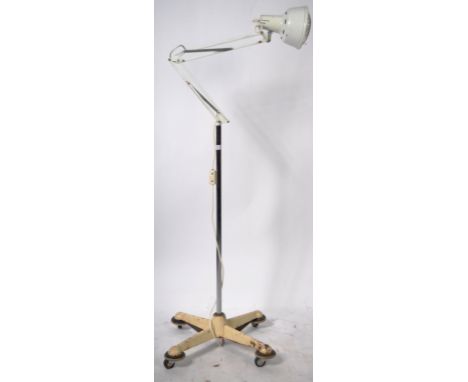 A mid 20th Century freestanding Industrial floor standing / upright standard anglepoise lamp light upon a trolley base. The w