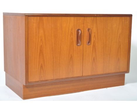 Victor B. Wilkins - G Plan - Fresco - A mid 20th Century 1960's retro vintage teak wood&nbsp;twin door cupboard by G-Plan in 