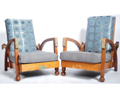 A fine pair of early 20th Century English antique vintage Art Deco reclining oak framed easy / lounge chairs / armchairs. Eac