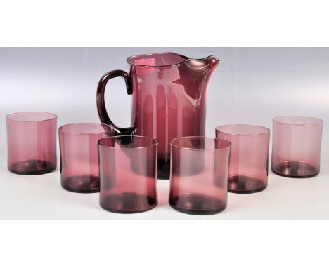 Bjorkshult - A 20th Century Swedish retro vintage studio art glass lemonade set in amethyst glass comprising of six beaker cu