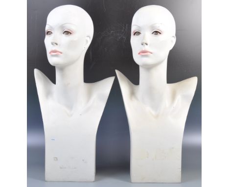 A matching pair of 20th Century retro vintage point of sale shop display table / counter top mannequin head and torso stands.