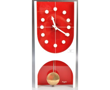 Presta - Japan - A fabulous mid 20th Century 1970's retro vintage wall hanging clock of acrylic construction by Presta of Jap